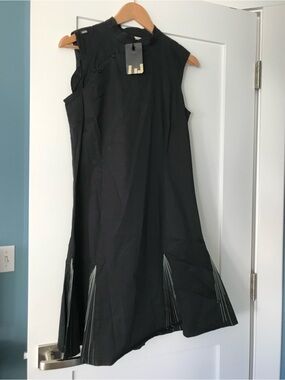 Sleeveless Black A-Line Dress with Pleated Inset Panels